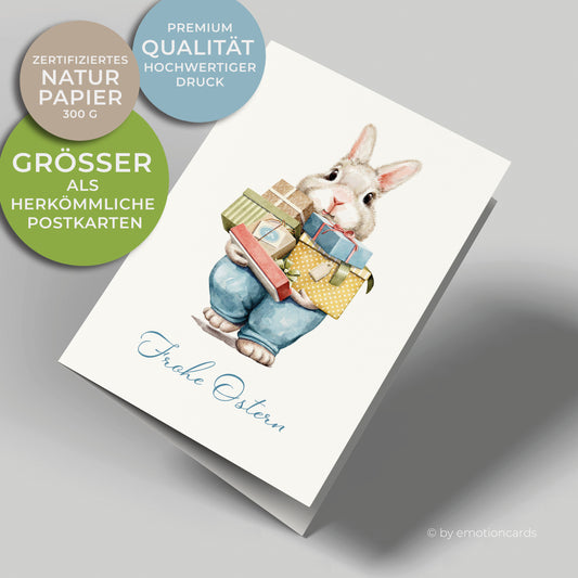 Süße Osterkarte, kleiner Hase in blauer Hose trägt viele Geschenke