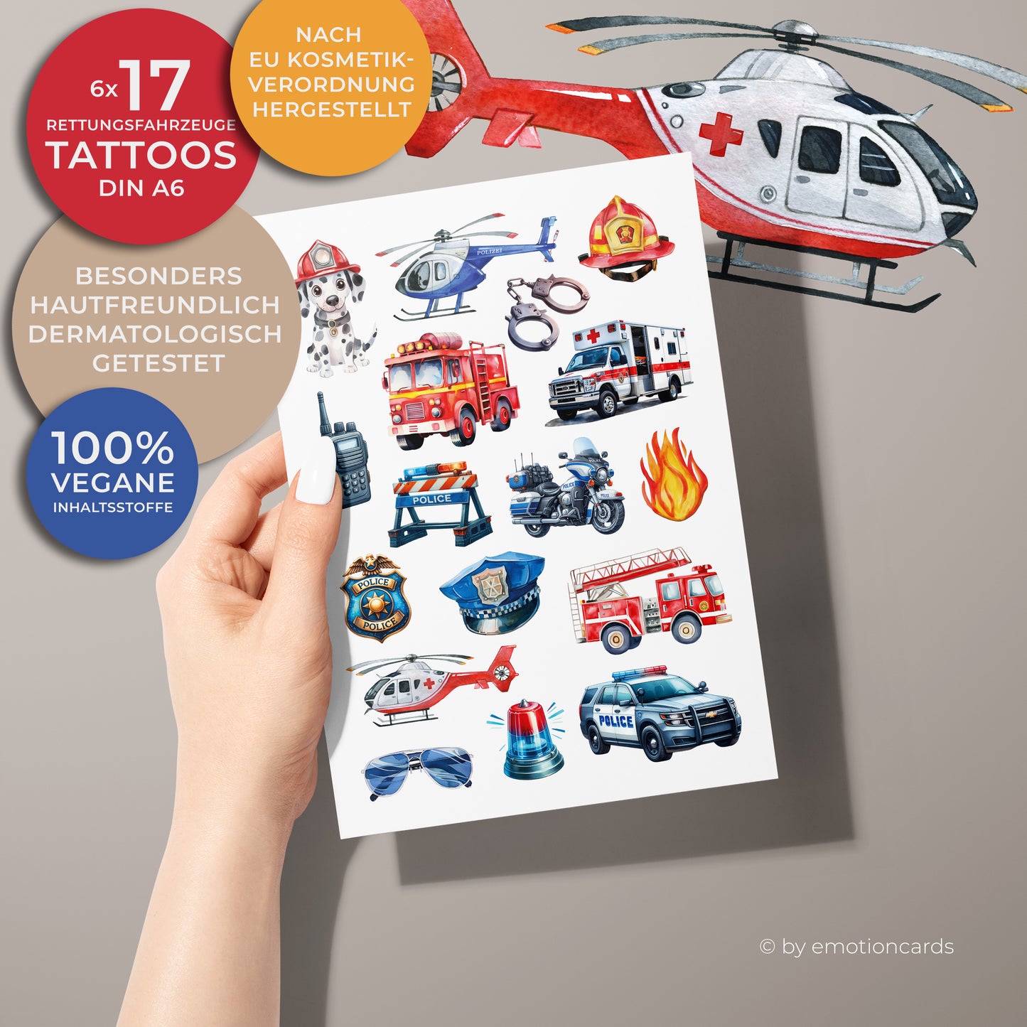 Dieses Bild zeigt ein Set von Kindertattoos mit Rettungsfahrzeugen. Die Motive sind farbenfroh und kindgerecht illustriert im Aquarellstil. Das Thema dreht sich rund um Polizei, Feuerwehr und Rettungsdienst. Abgebildet sind unter anderem: Feuerwehrauto, Polizeiauto, Rettungswagen, Polizeimotorrad,
Hubschrauber (Polizei & Rettung), Feuerwehrhelm & Polizeihelm, Polizeimarke, Handschellen, Blaulicht, Funkgerät, Sonnenbrille, Flamme und ein Dalmatiner mit Feuerwehrhelm